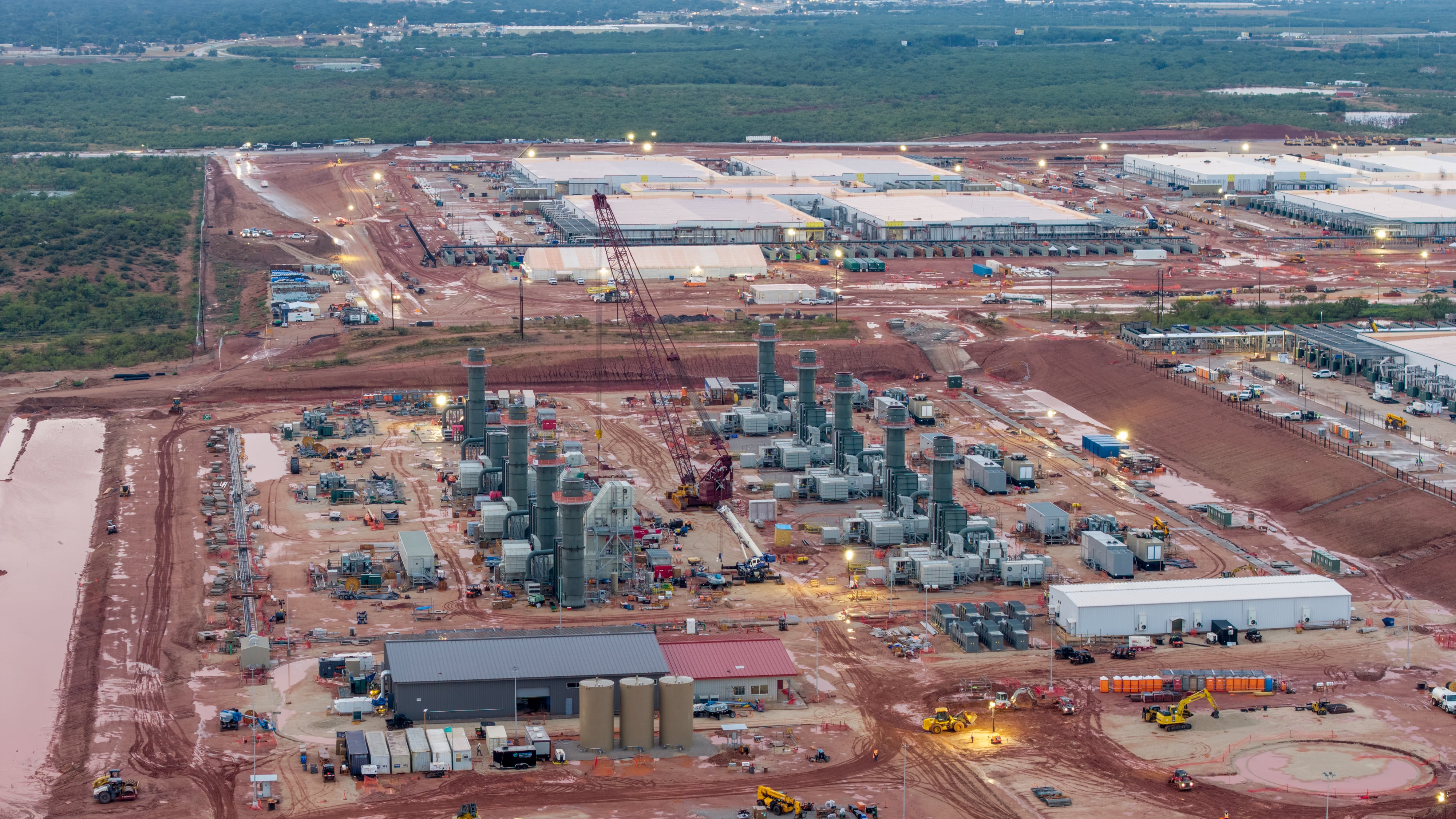 Construction on gas turbines at a data center site.