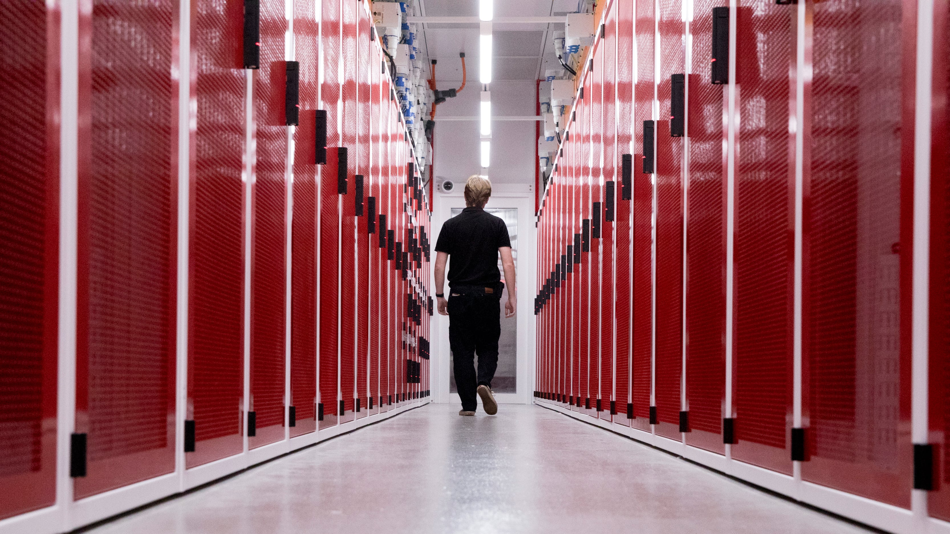 Cabinets housing servers inside a data center.