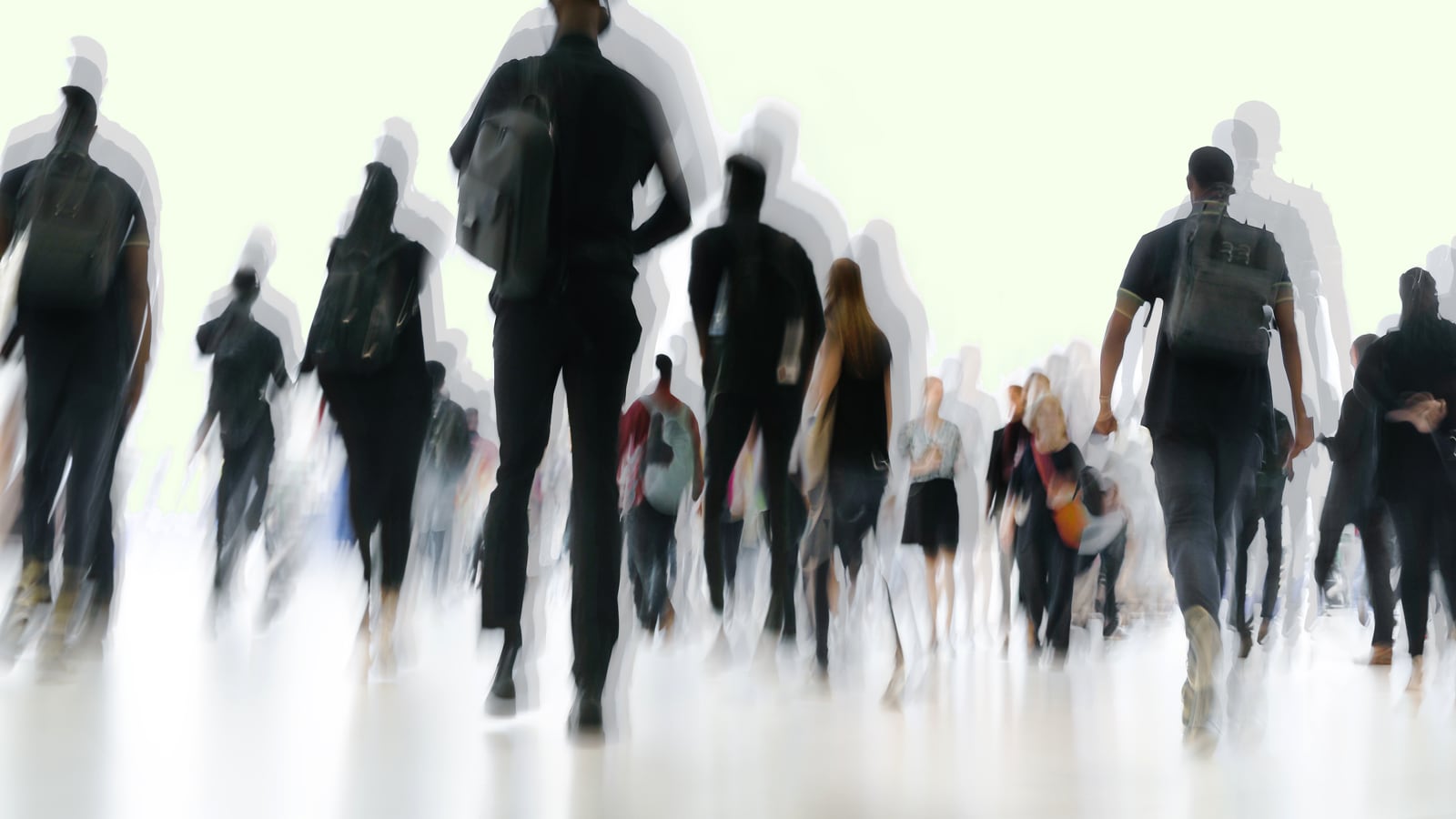 Silhouettes of people exiting