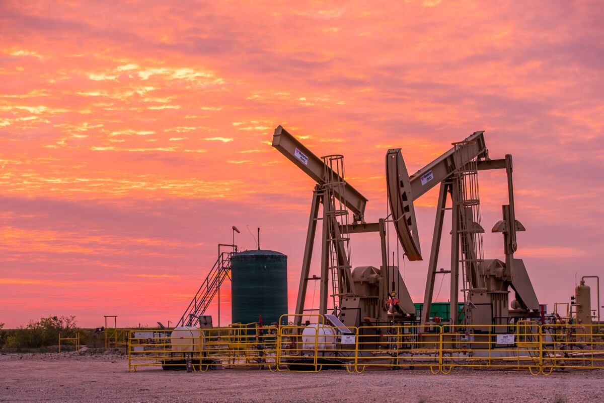 SM Energy pumpjacks in south Texas Eagle Ford against a sunset